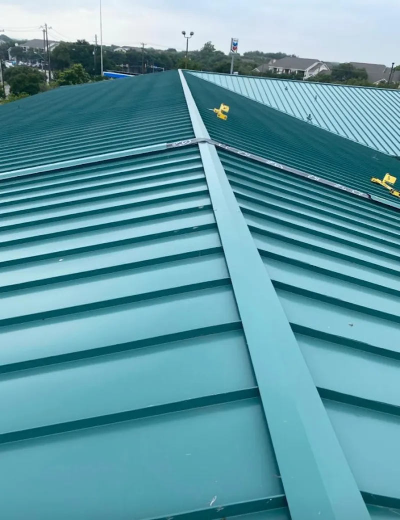 Green commercial metal roof ridge and valley for Metal Roof Repair in North Stonington