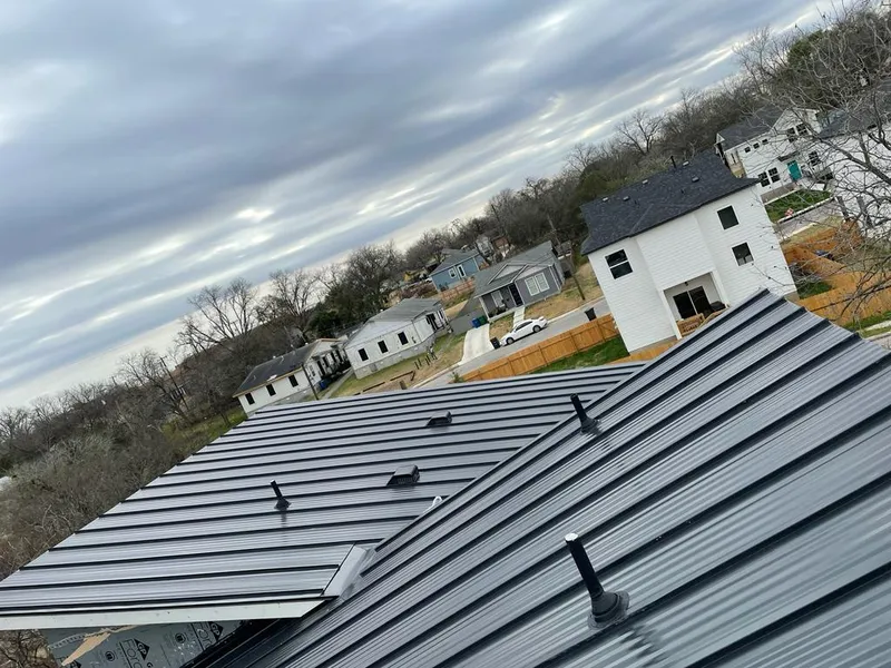 Standing seam metal roof panels with vents for Skylight Repair in North Stonington
